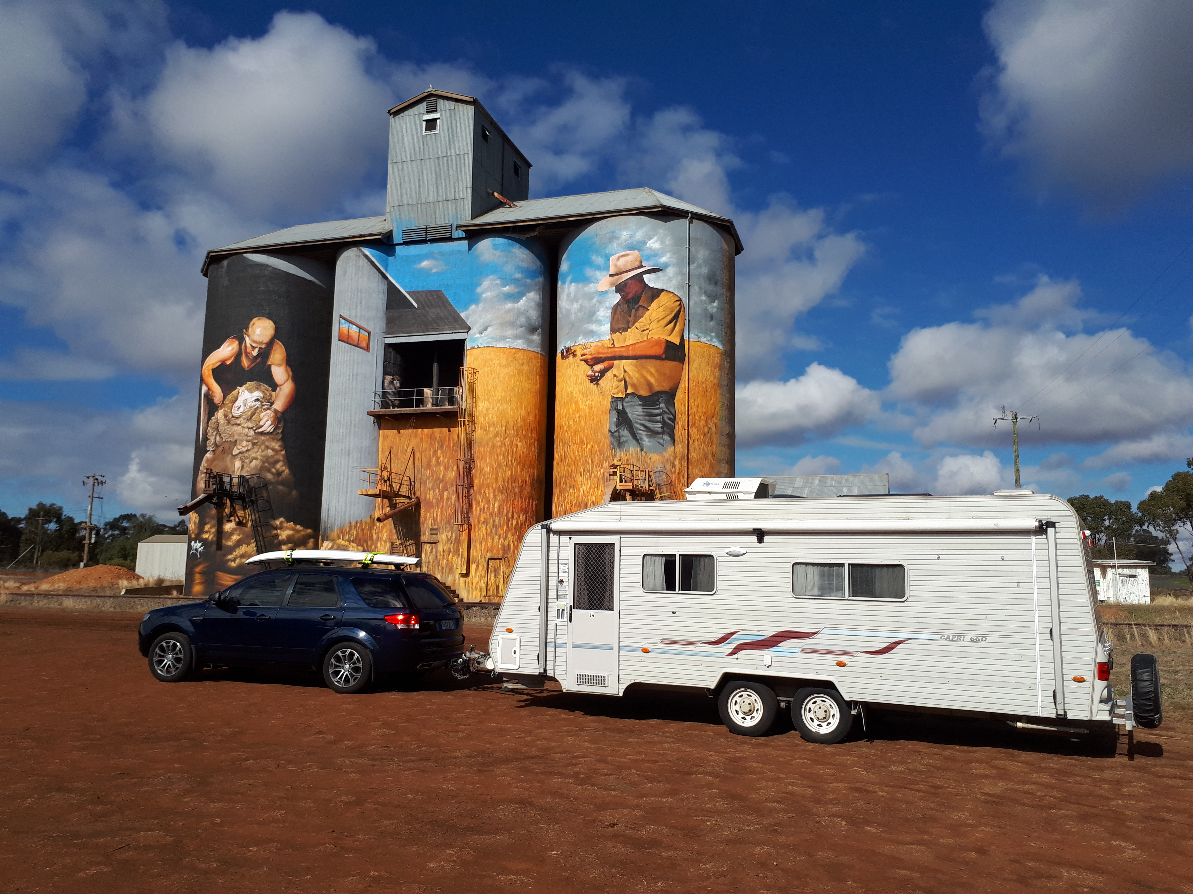 My caravan aptly named "24", my car and I on the road out of South Australia